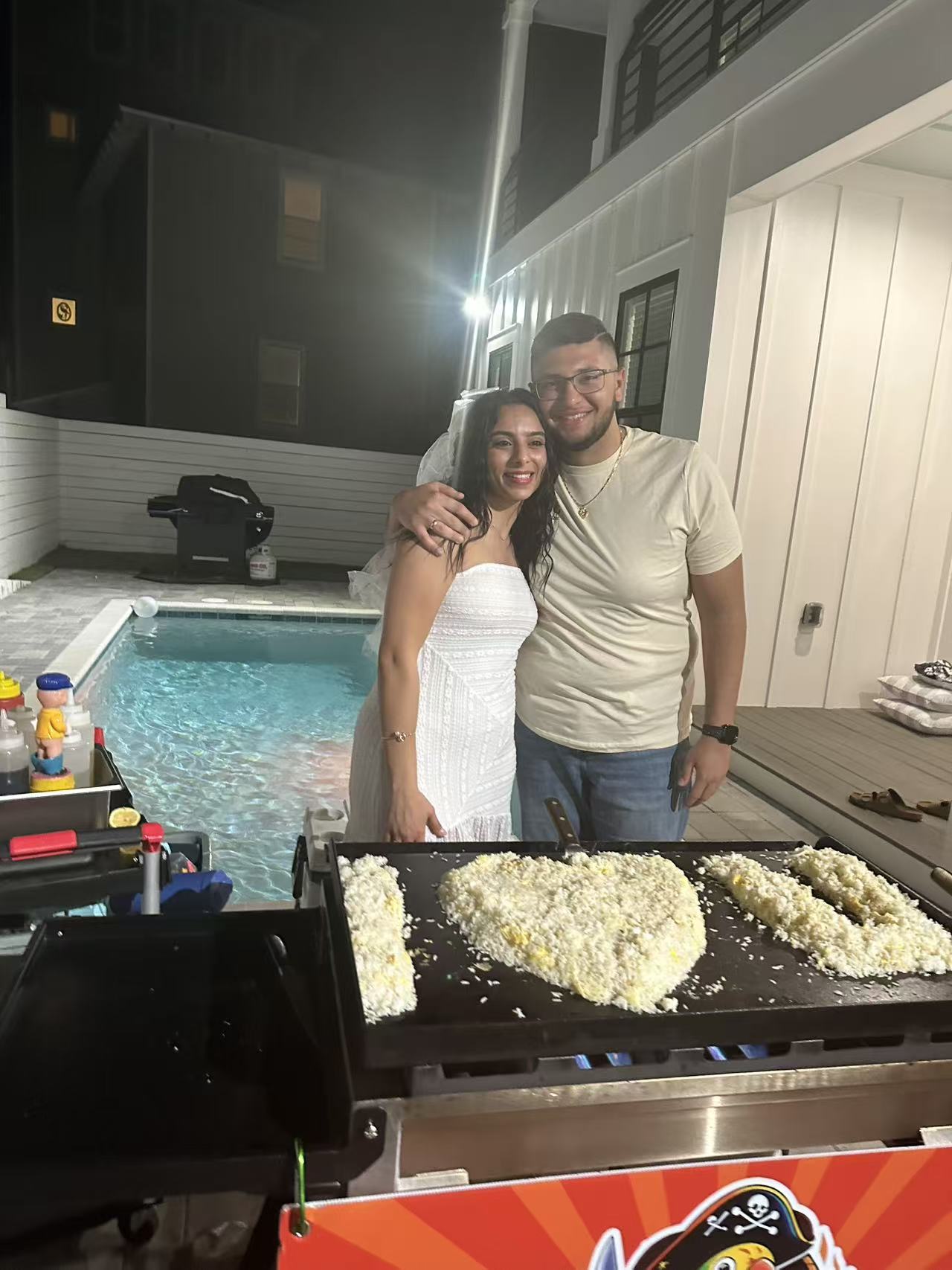 Group of friends celebrating at private hibachi catering event in Northwest Florida